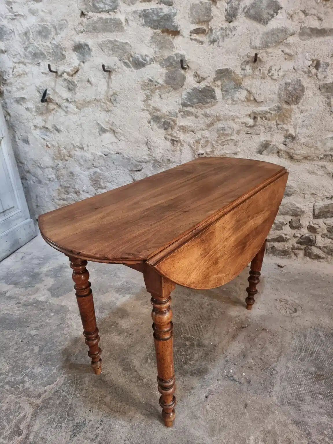 Antique French walnut folding dining table