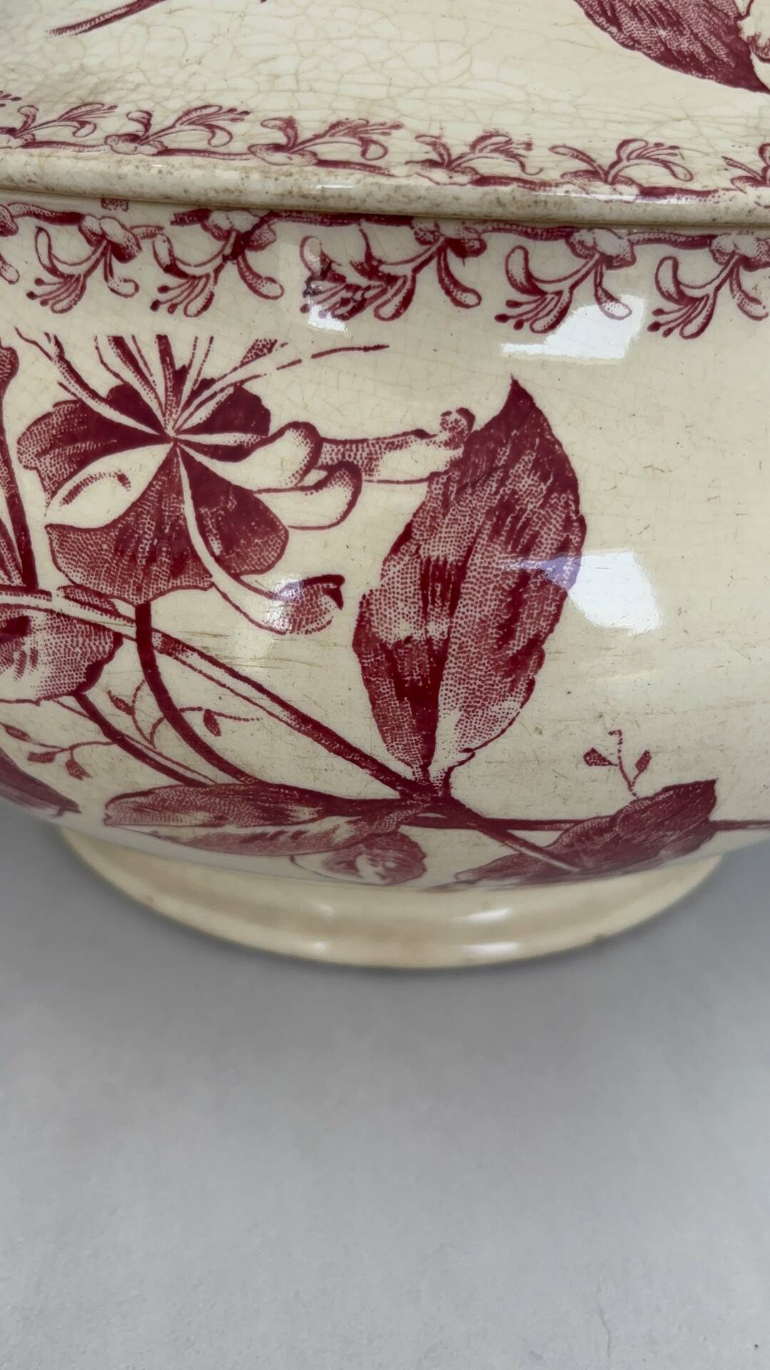 Red earthenware soup tureen, Gien factory, honeysuckle model.