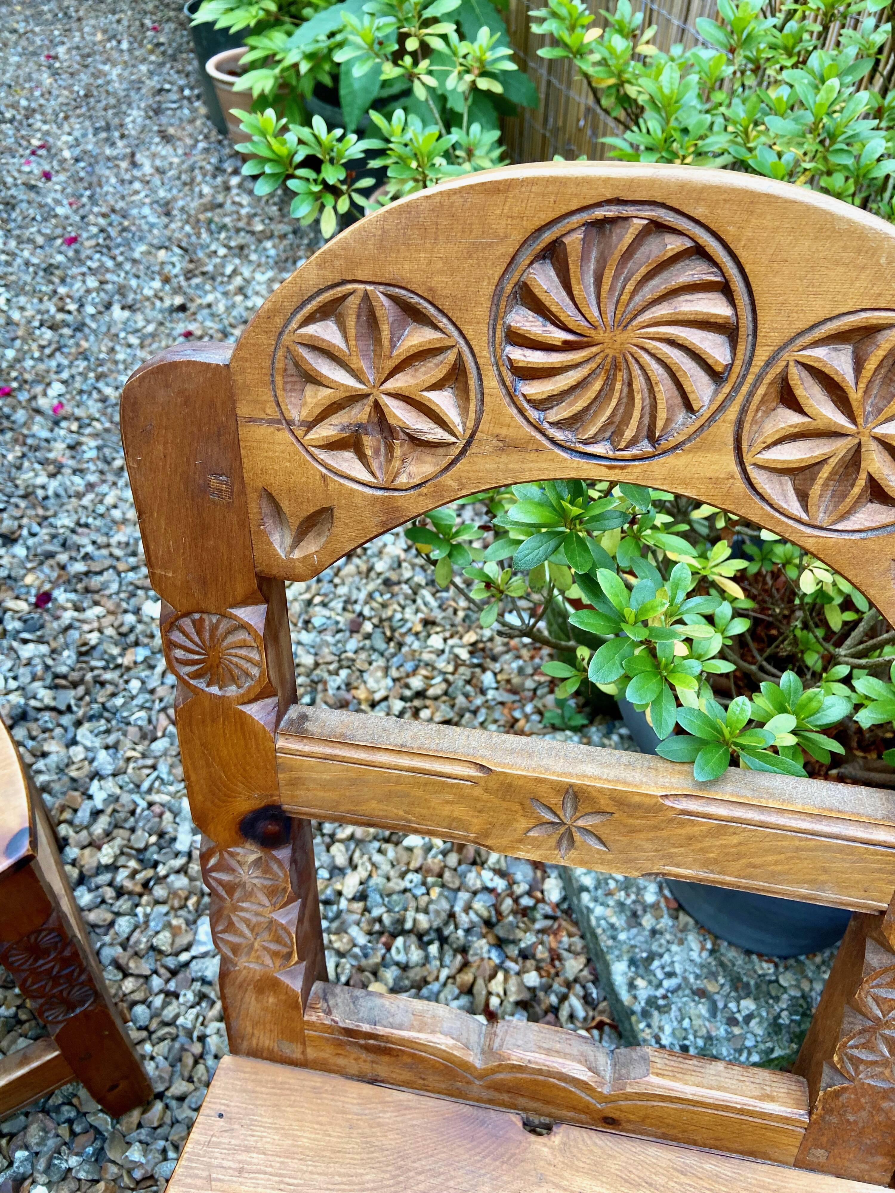 Set of 2 carved wooden chairs