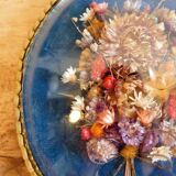 Oval frame bouquet of dried flowers with curved glass