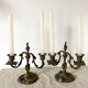 Pair of antique bronze candlesticks at the end of the table XIXth