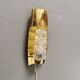 Older wall lamp in brass with hard pressed glass shade.