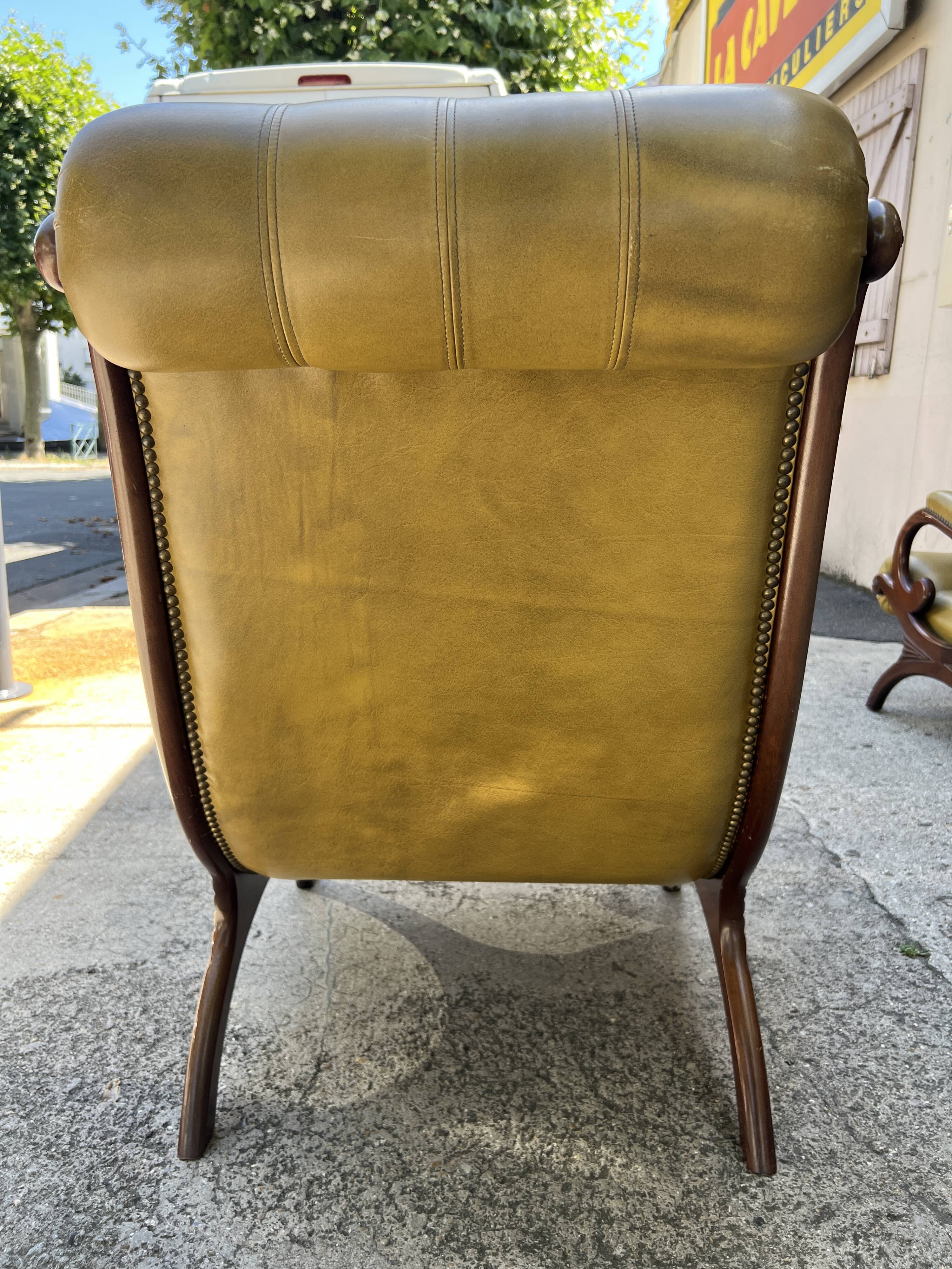 Victoria style green leather chesterfield armchair