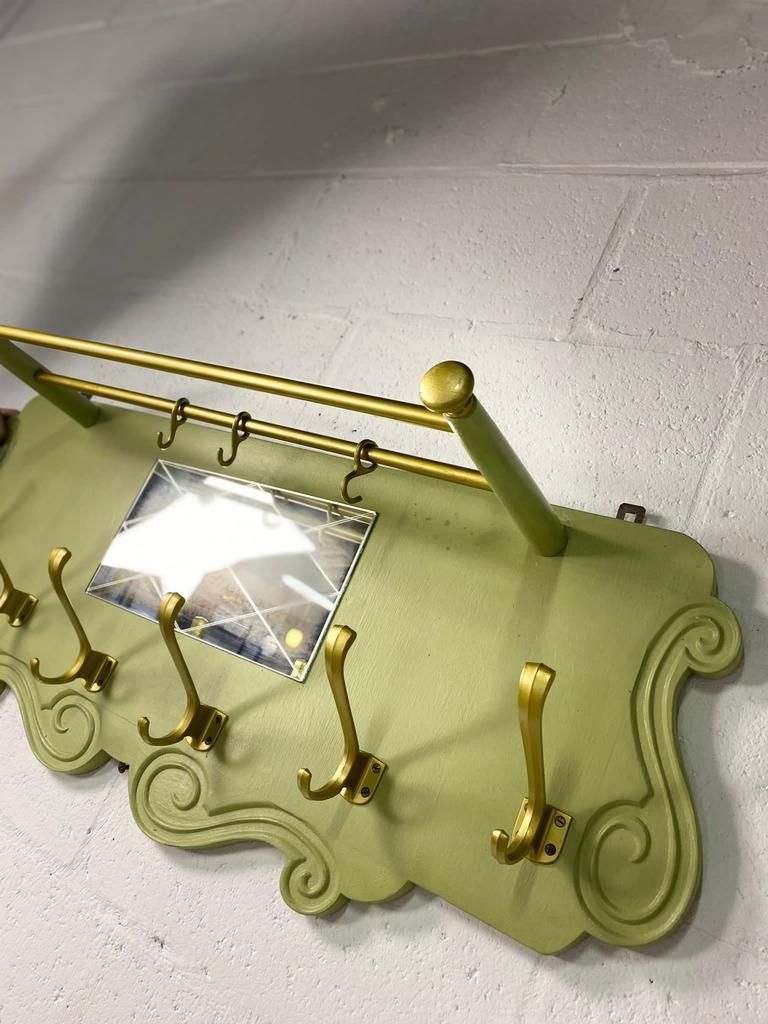 Vintage olive green wall coat rack with mirror