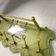 Vintage olive green wall coat rack with mirror