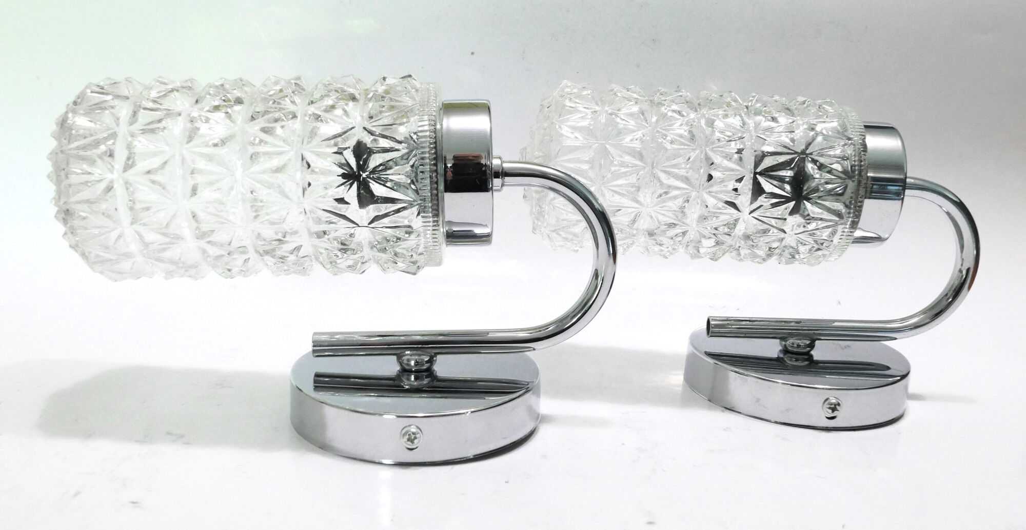 Pair of 1970 chrome metal wall light and molded glass globes.