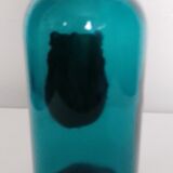 Flacon en verre et son bouchon bleu turquoise