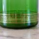 Green vintage apothecary pot and golden ledé