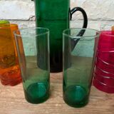 Mismatched colored glass orangeade set with pitcher and 6 glasses