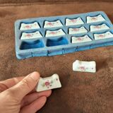 Set of 12 porcelain knife rests