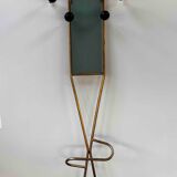 Coat rack on golden stand