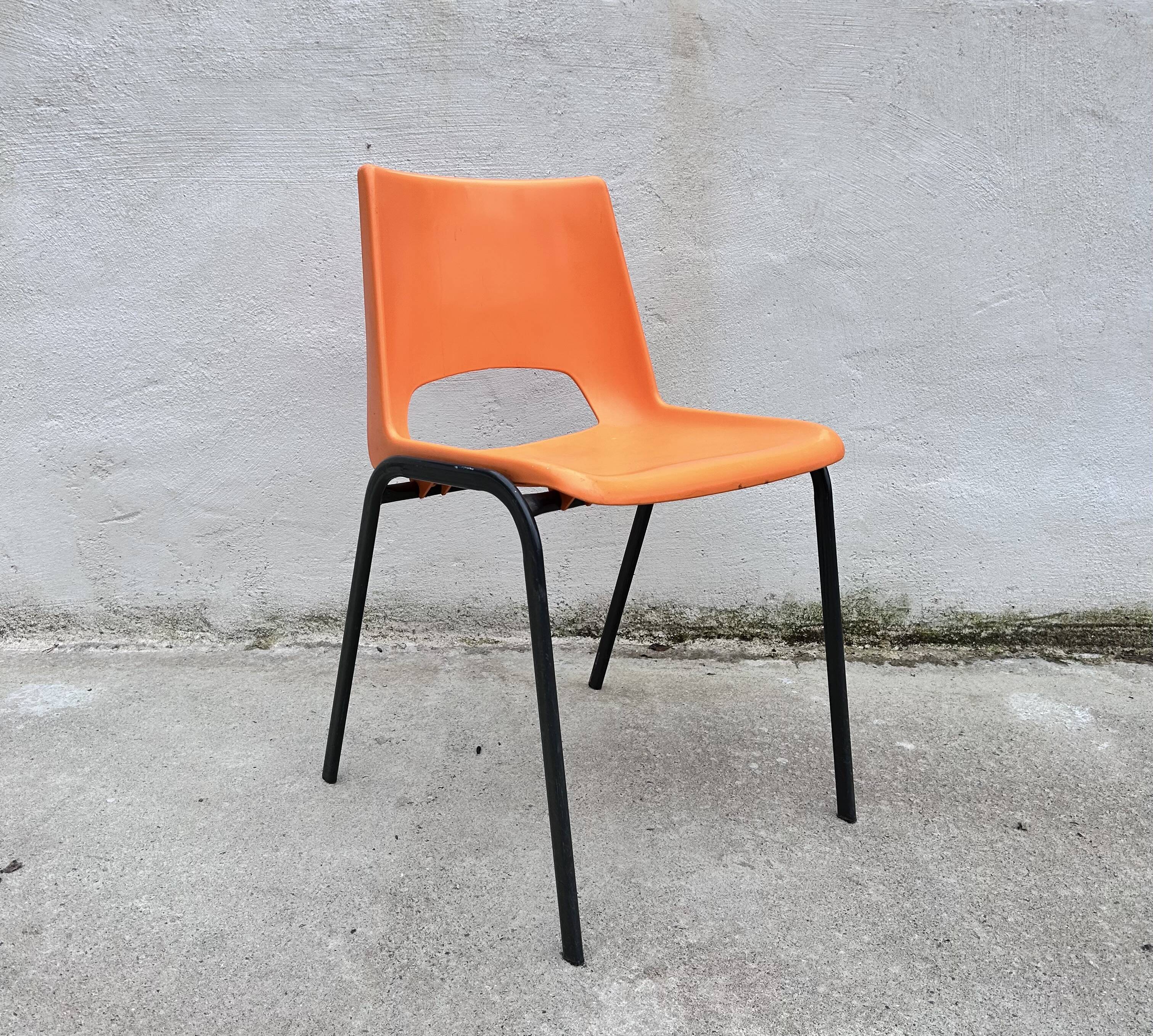 Orange plastic shell chair