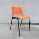 Orange plastic shell chair