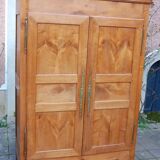 Louis Philippe wardrobe in golden cherry wood from the 19th century.