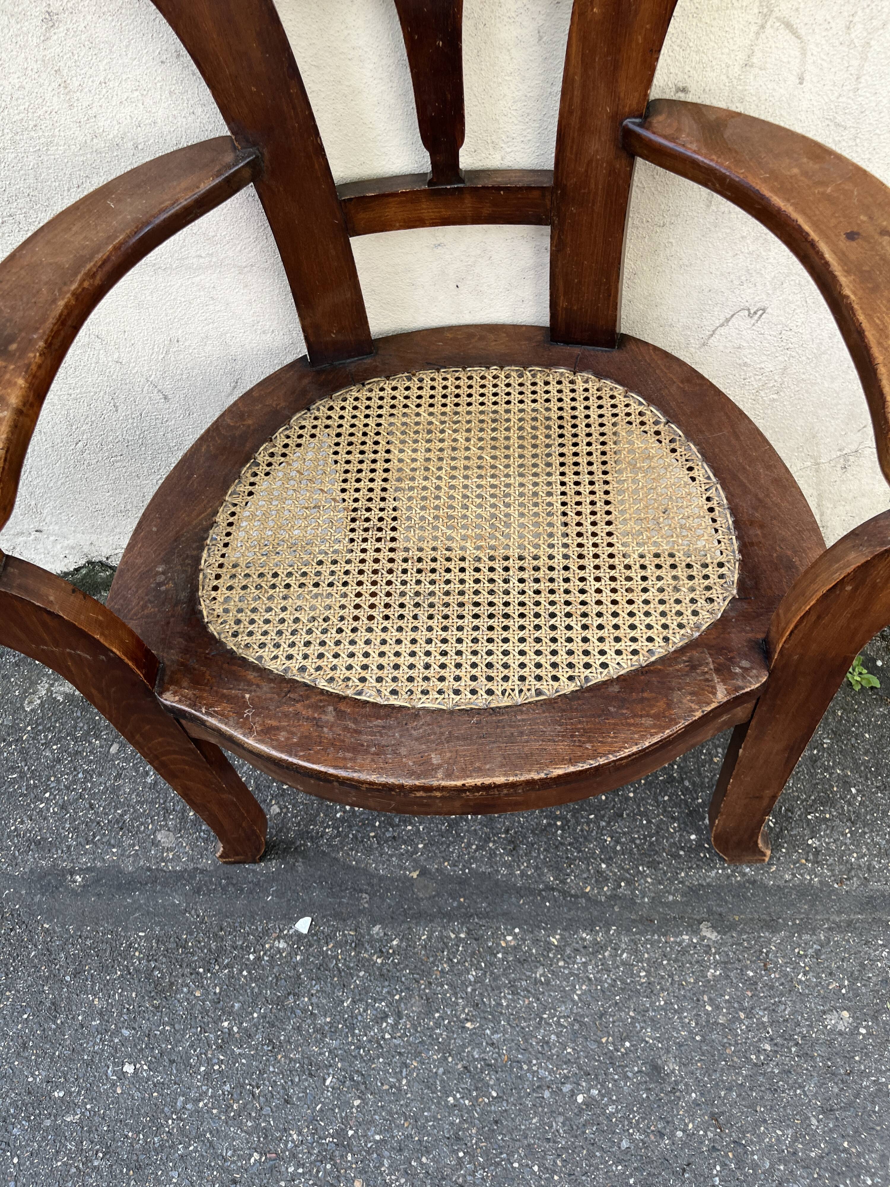 Large caned armchair