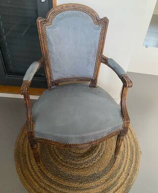 Pair of cabriolet armchairs in light grey and dark grey Louis XV style.