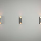 Set of three aluminium cylindrical wall lamps