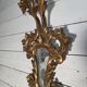 Italian mirror in gilded wood with gold leaf from the 18th century.