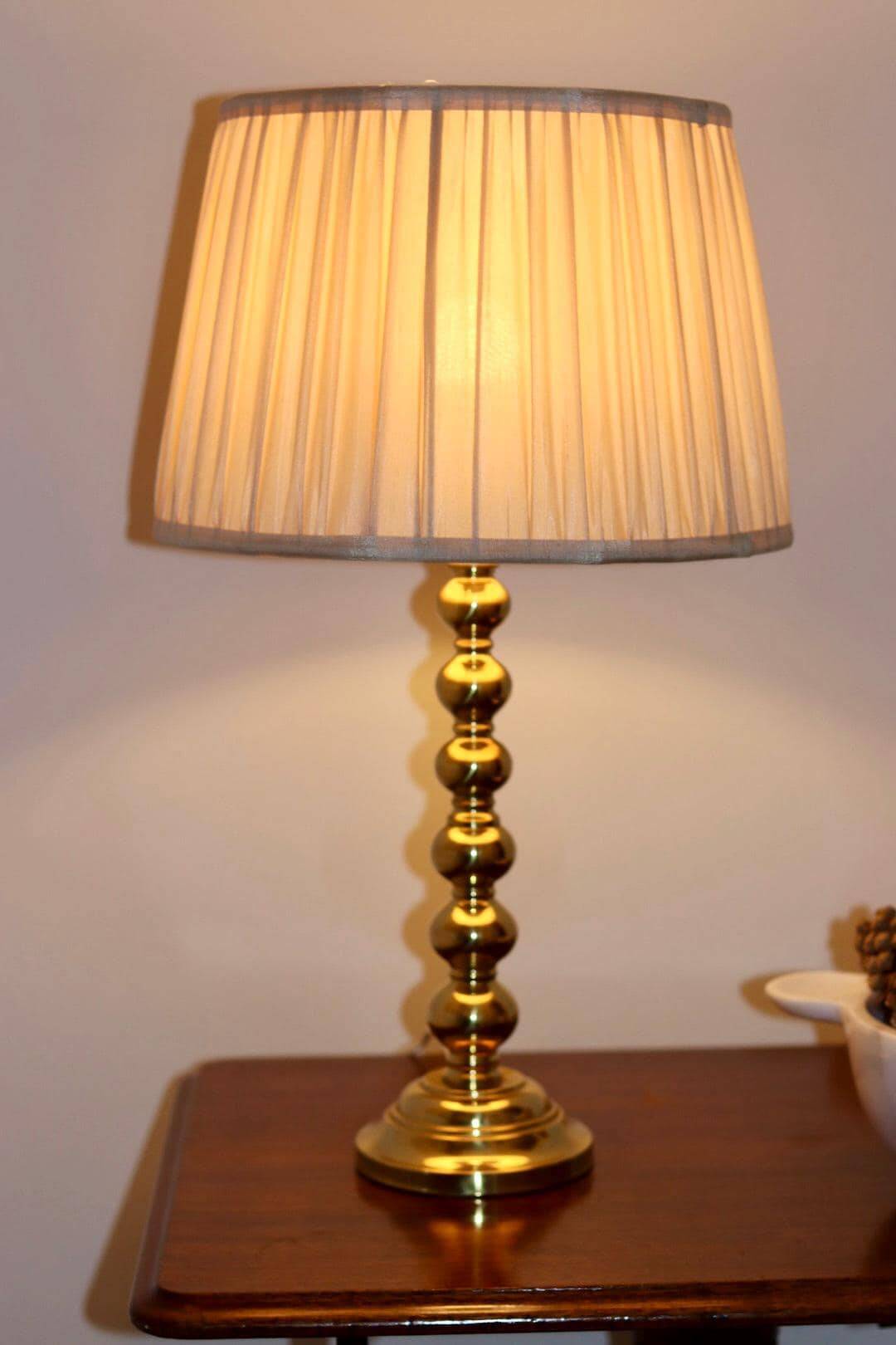 Pair of Swedish brass lamps from the mid-century.