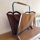 Vintage magazine rack from the 1950s, leather, brass, wood.