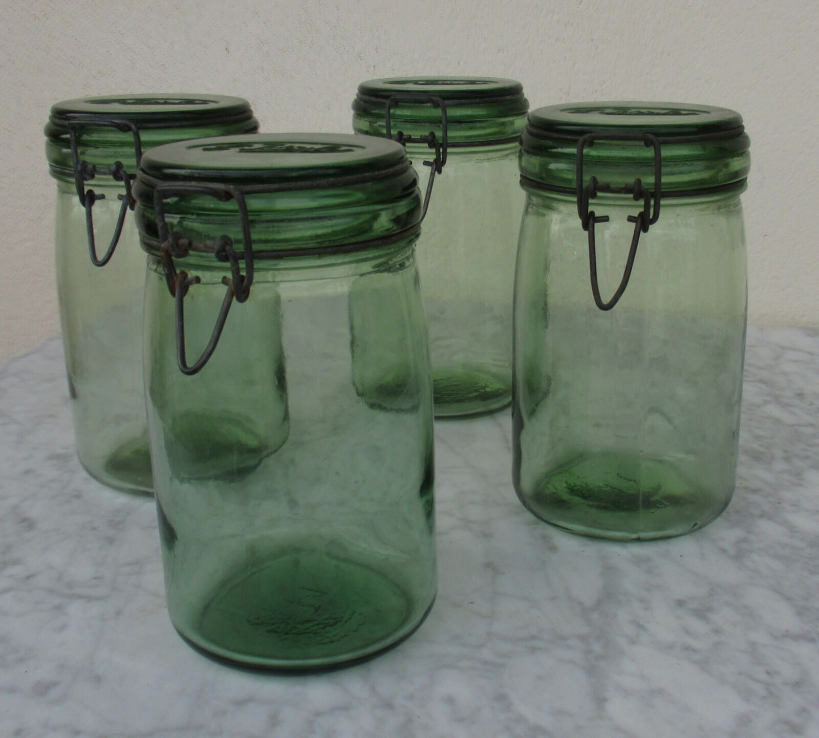 4 "Ideal" brand jars