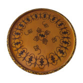 Round top in carved wood and vintage varnish