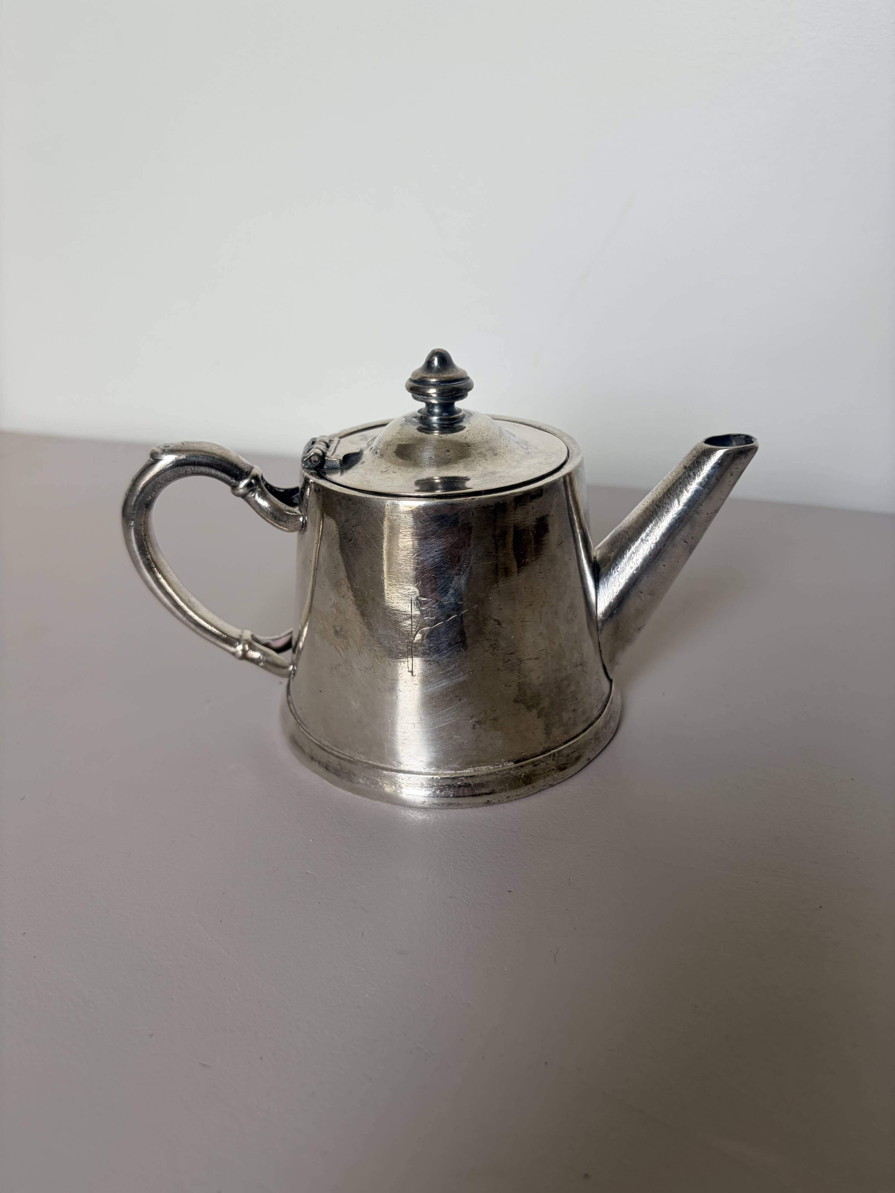 Silver-plated metal teapot vintage potter 240546