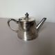 Silver-plated metal teapot vintage potter 240546