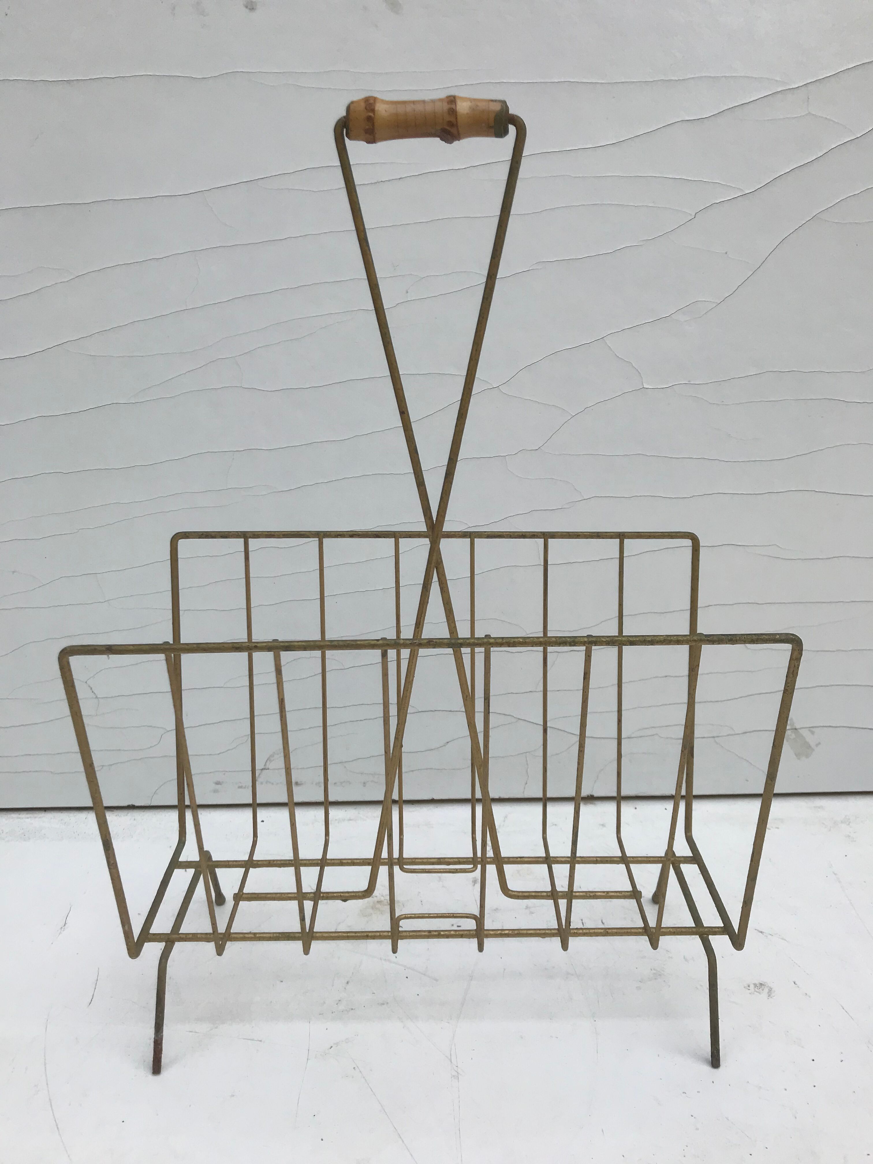 Magazine holder in golden metal and its handle is in bamboo, 1960 vintage