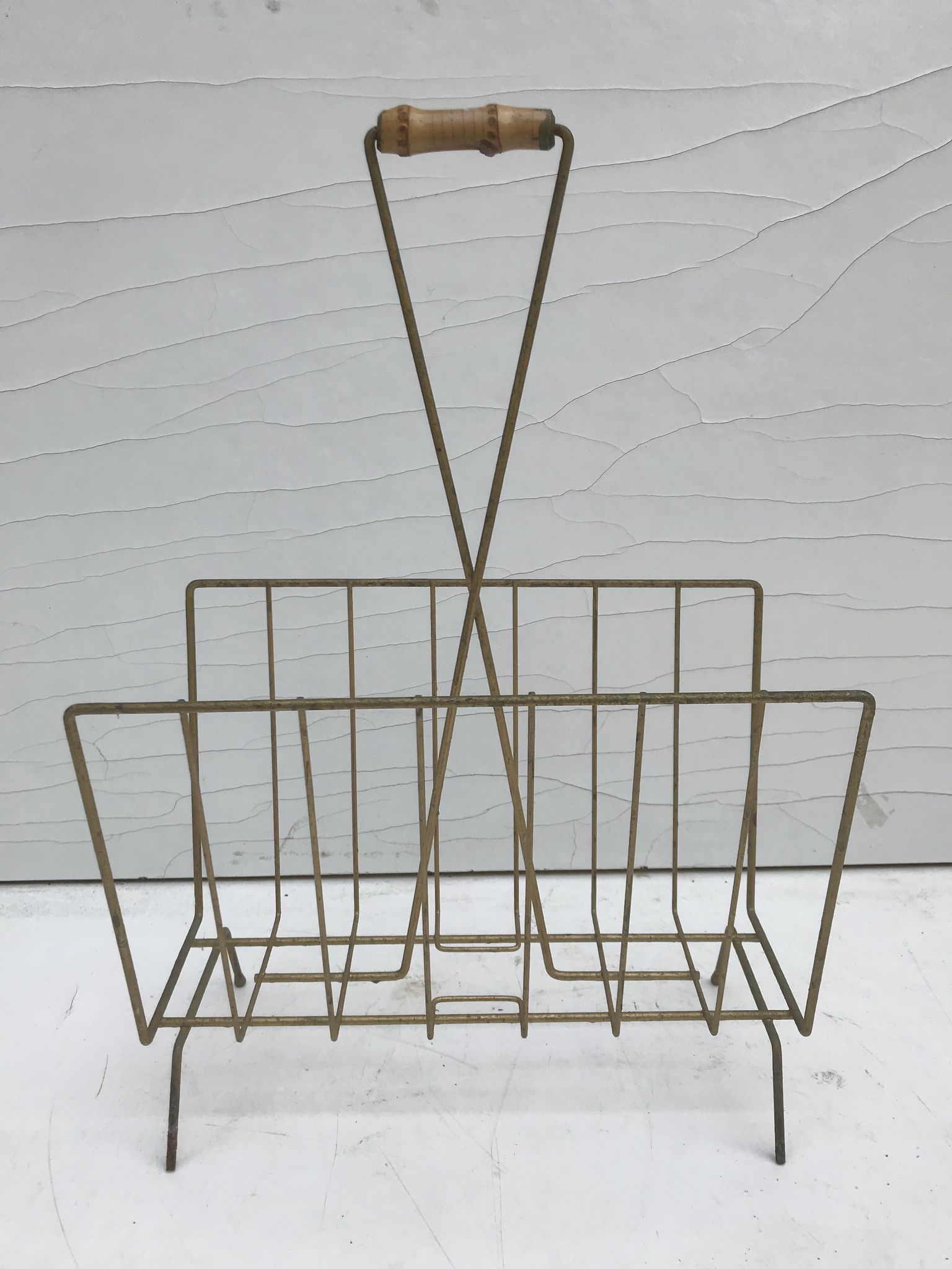 Magazine holder in golden metal and its handle is in bamboo, 1960 vintage