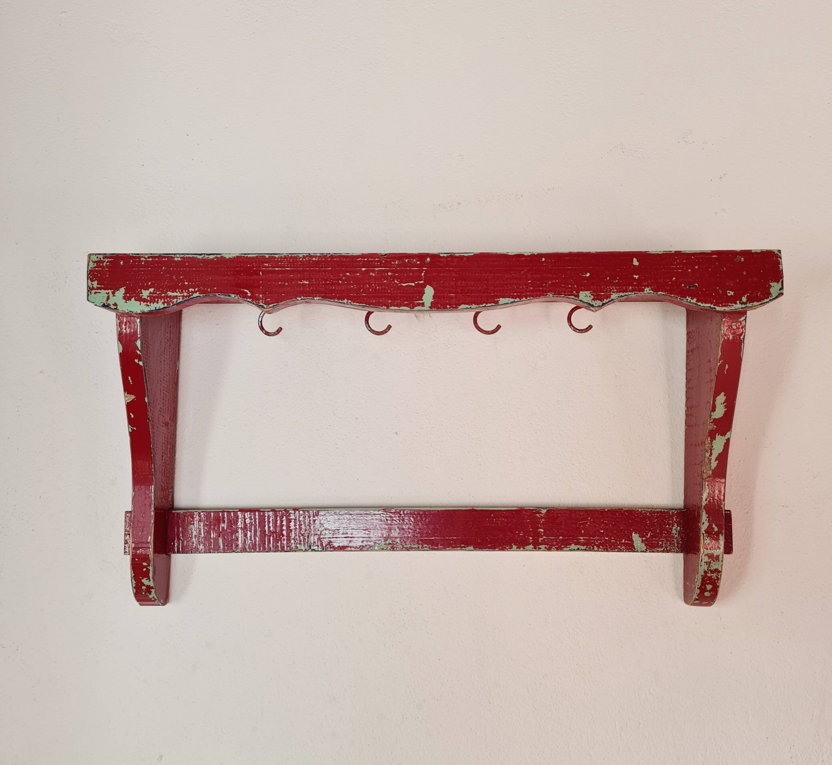 Wall shelf in garnet red wood