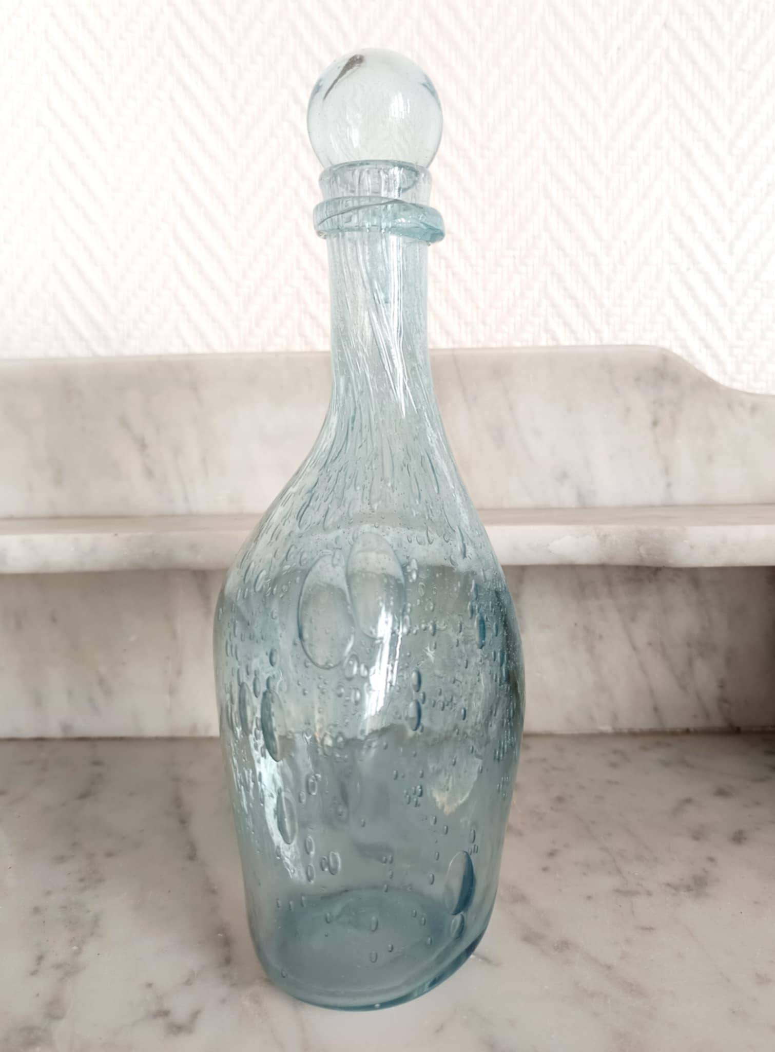 Two bubble glass carafes