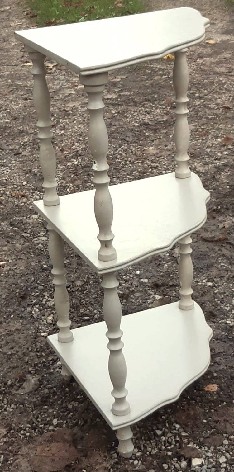 pedestal table with 3 shelves in beige painted wood