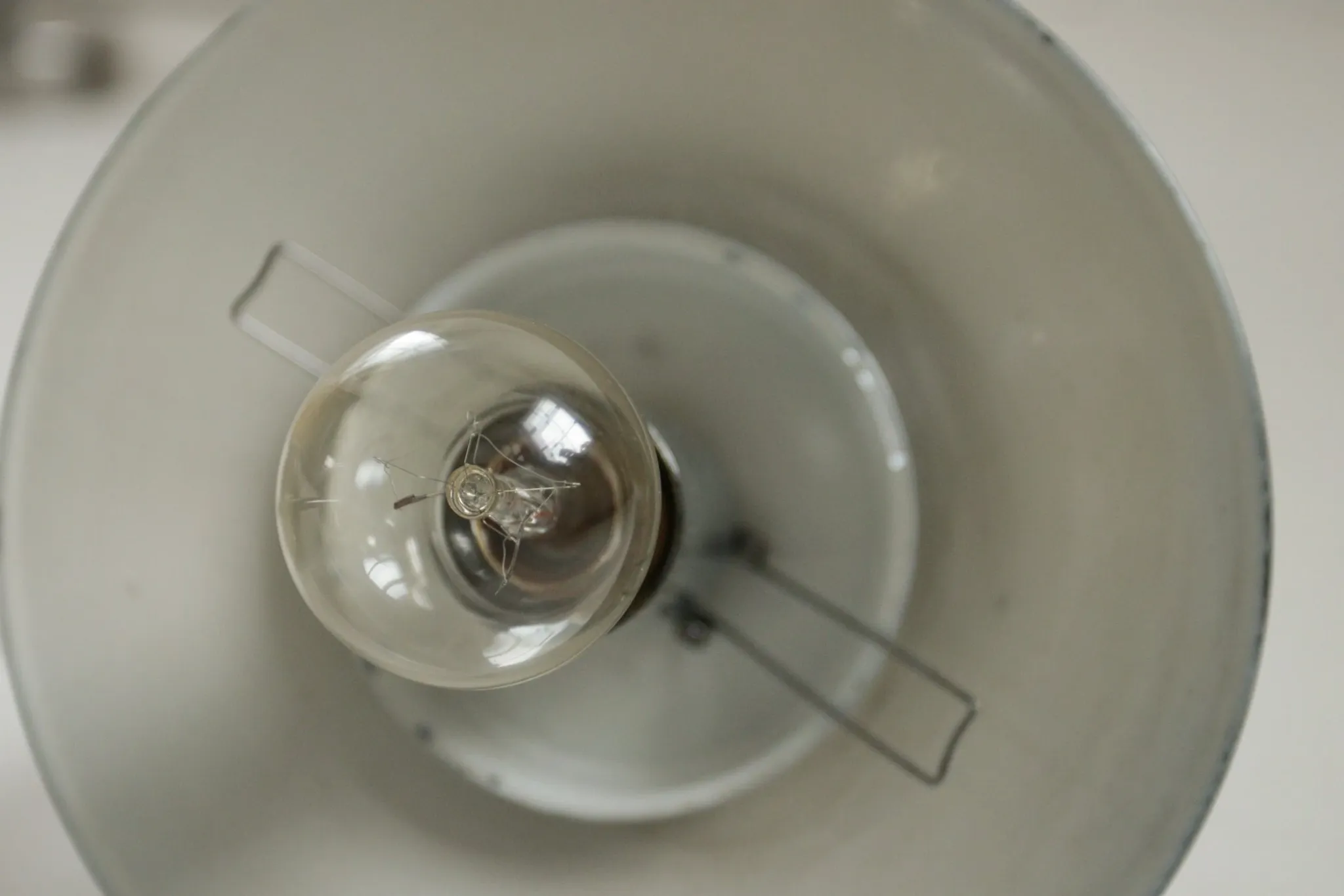 Pair of European mid-century chrome wall sconces with mirrored globe shades