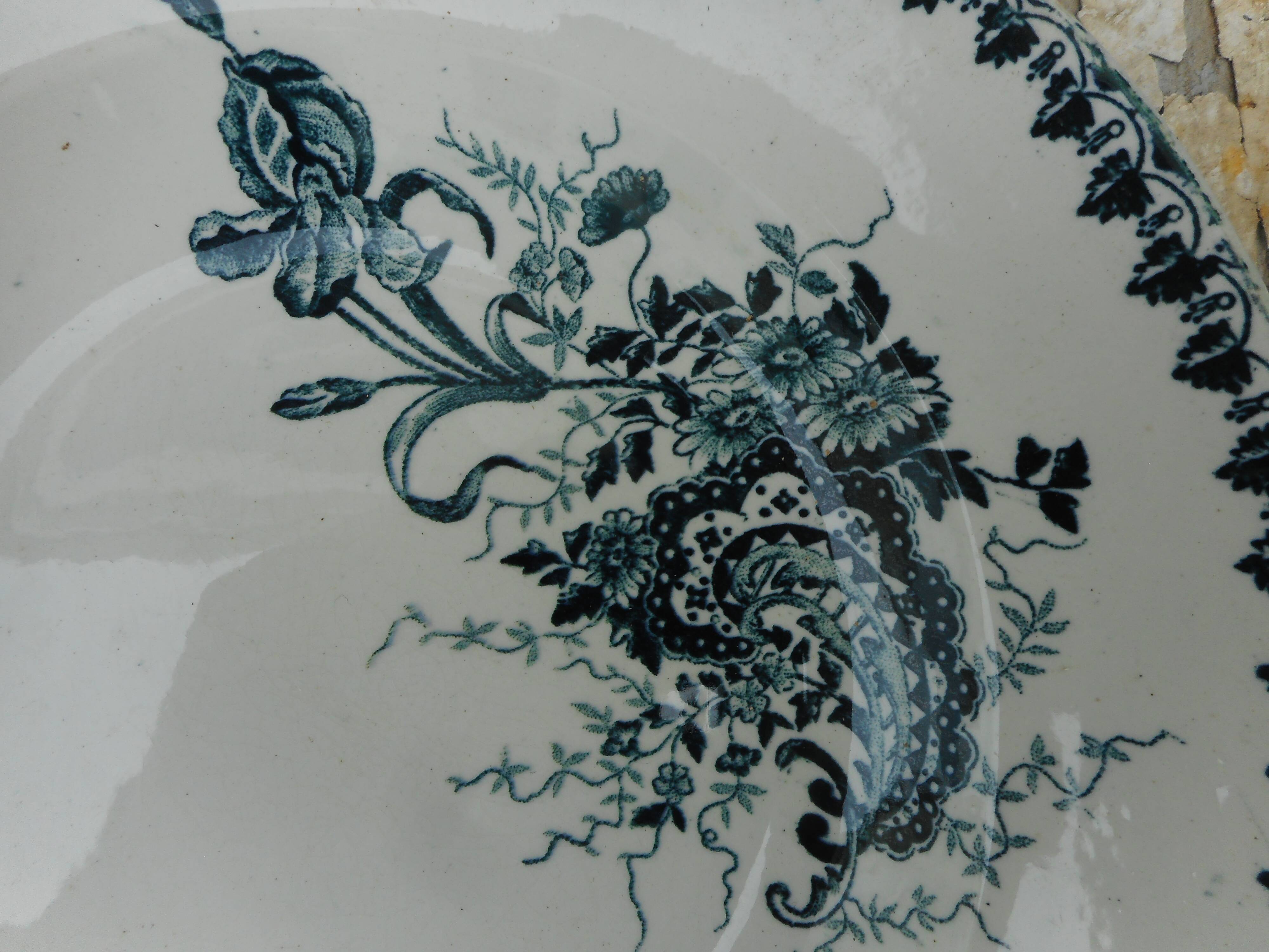 Two hollow plates made of earthenware