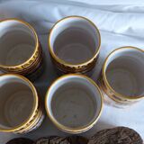 5 ceramic spice jars.