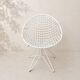 Fauteuil vintage en treillis d'acier laqué blanc – design moderniste