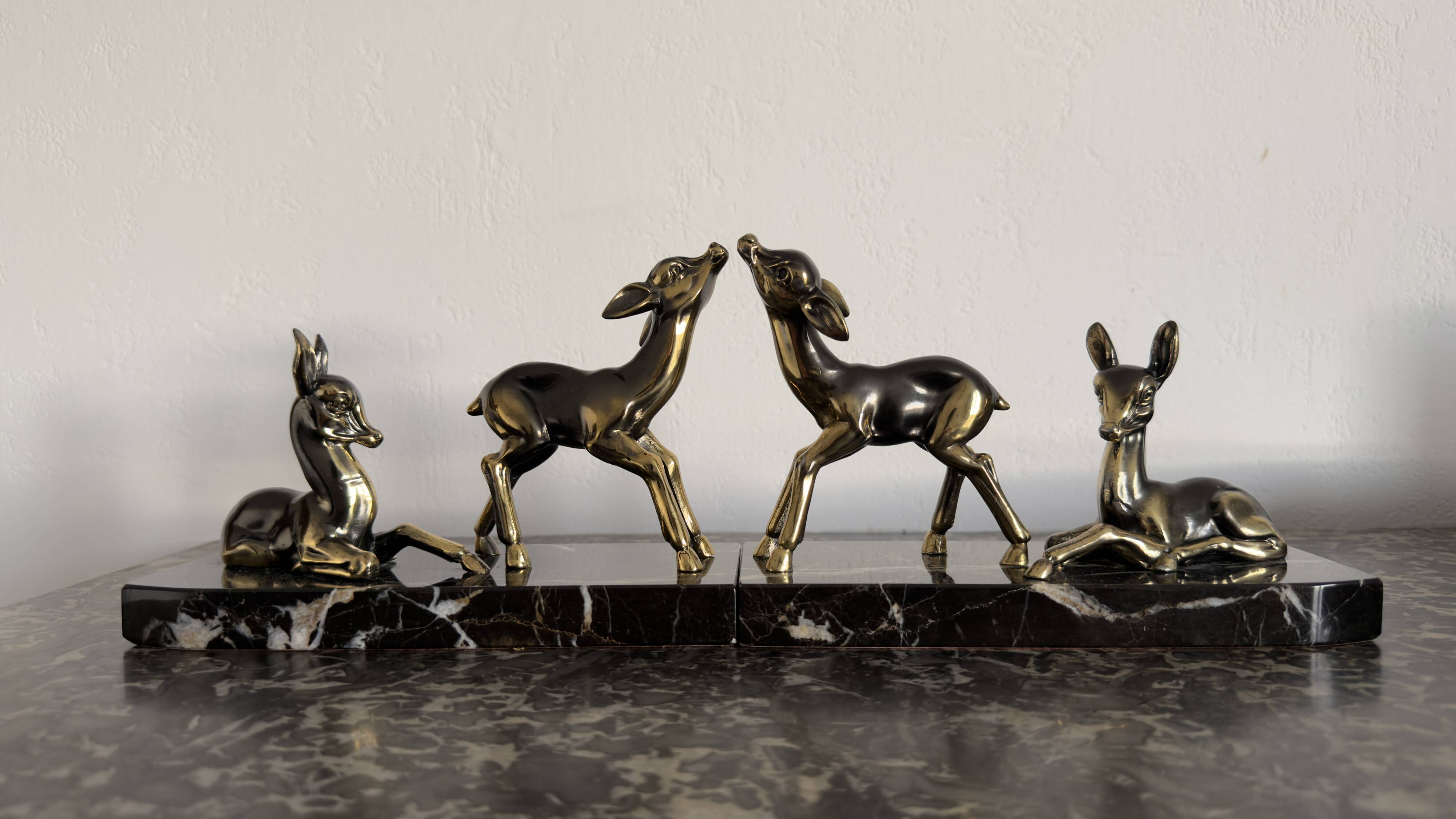 Art Deco bookends "Doe & Fawn" in black marble and gold metal