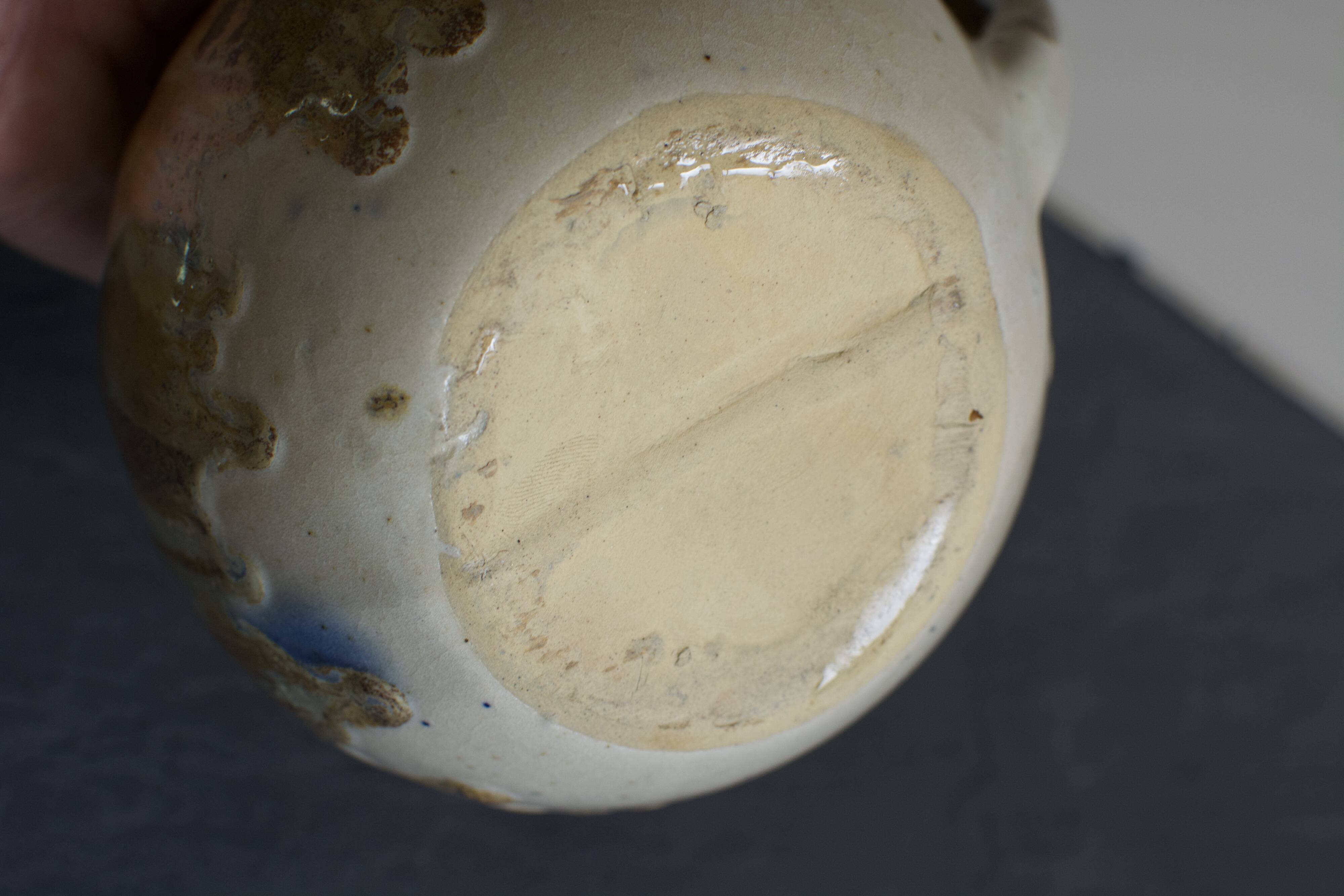 Vintage blue glazed stoneware pitcher