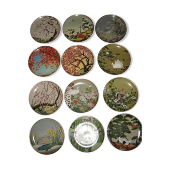 Série de 12 assiettes en porcelaine du Japon signées Naoka Nobata