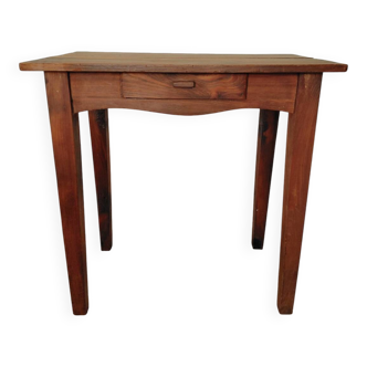 Small antique solid wood table in chic country style with a drawer.