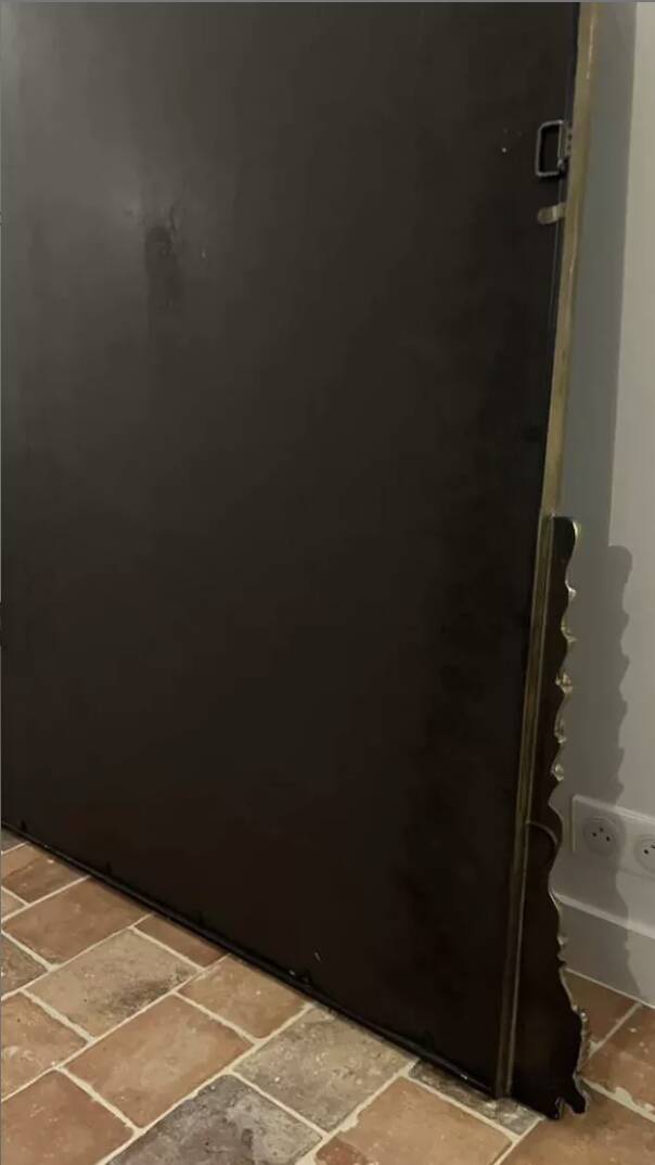 Large gilded mirror with pediment