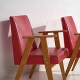 2 red armchairs, circa 1960