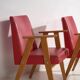 2 fauteuils rouges, vers 1960
