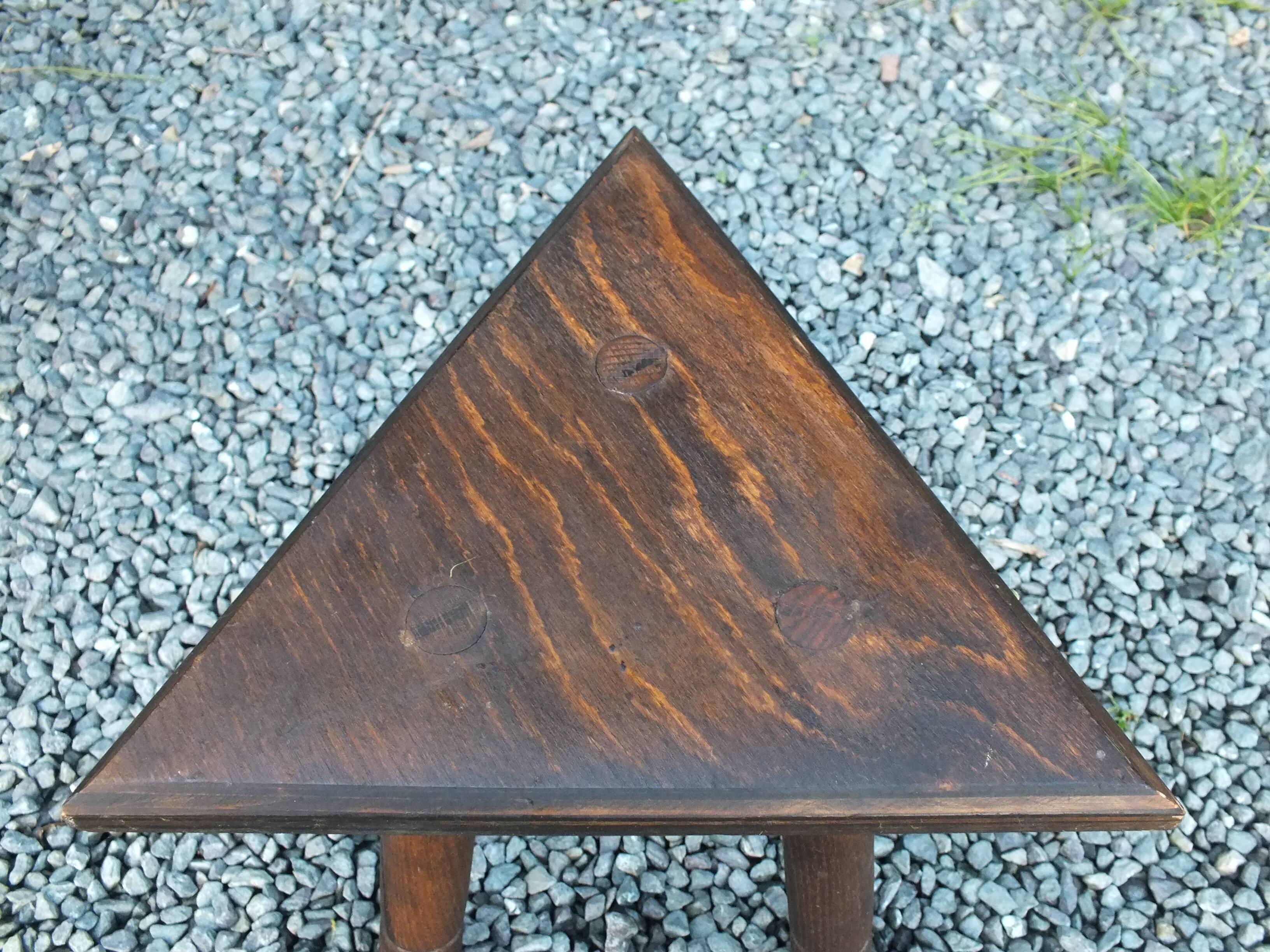 Pair of triangular turned wood stools or harnesses