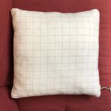Beige linen cushion with checkered pattern and shiny pink piping