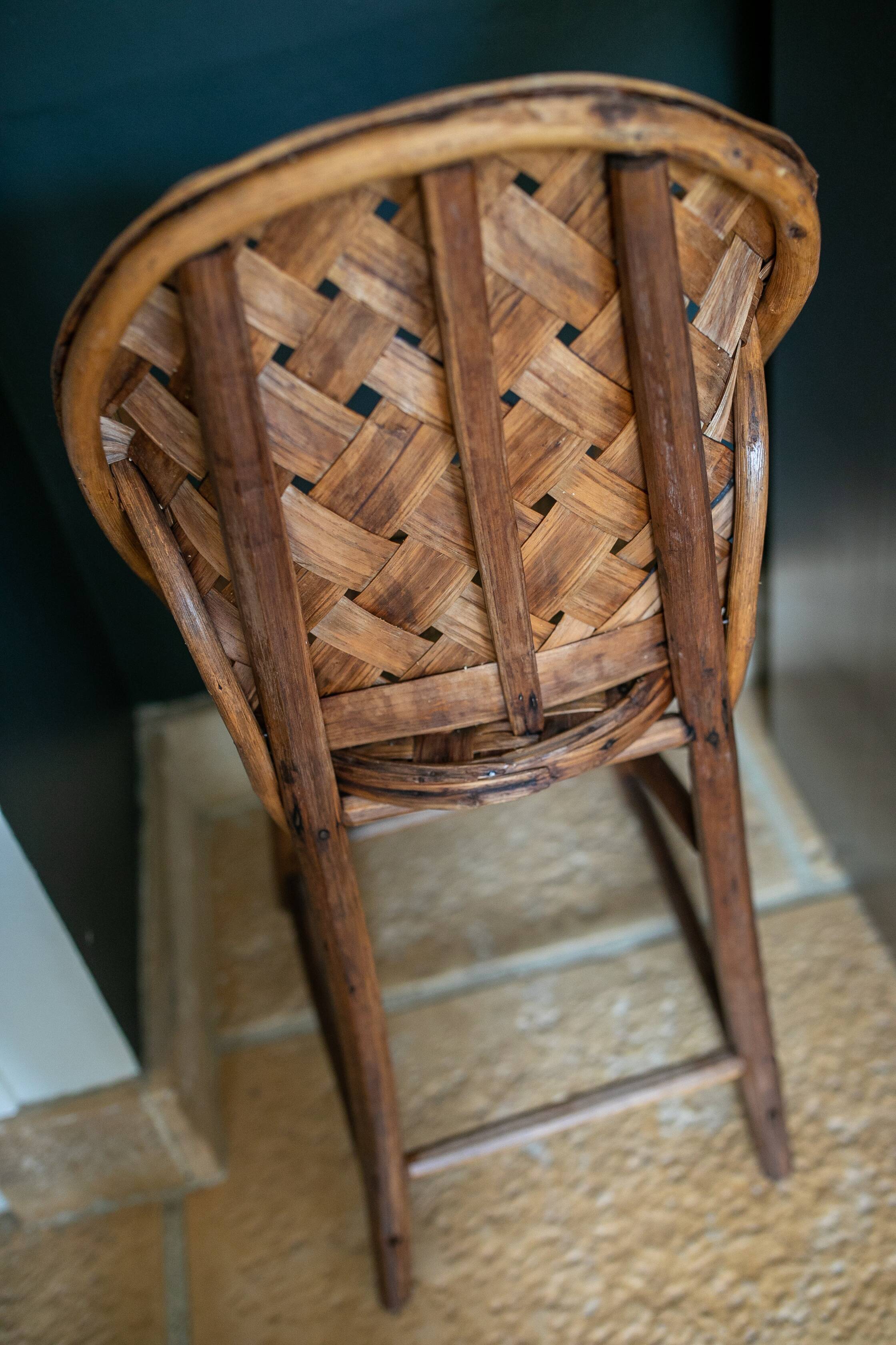 Chaise haute en rotin