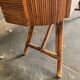 Rattan and wood bar with its decorative brass portholes