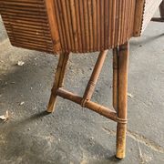 Rattan and wood bar with its decorative brass portholes