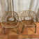 Deux fauteuils coquille en rotin, années 60 